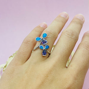 Sterling Silver Blue Synthetic Opal 3 Petal Flower Teardrop Bypass Ring