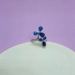 Sterling Silver Blue Synthetic Opal 3 Petal Flower Teardrop Bypass Ring