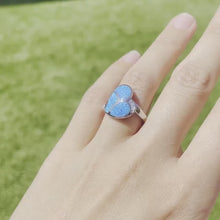 Load and play video in Gallery viewer, Sterling Silver Blue Synthetic Opal Sideways Heart Ring for Women CZ Accent
