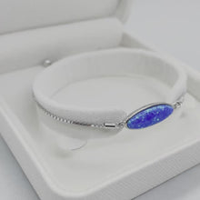 Load and play video in Gallery viewer, Sterling Silver Synthetic Opal Long Oval Sliding Clasp Bolo Bracelet for Women
