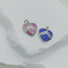 Load and play video in Gallery viewer, Sterling Silver Synthetic Opal Heart Blue Or Pink Pendant Charm
